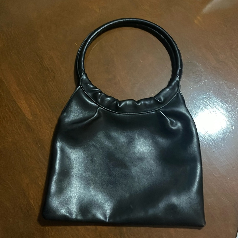 Multiplicity ring handle black bag